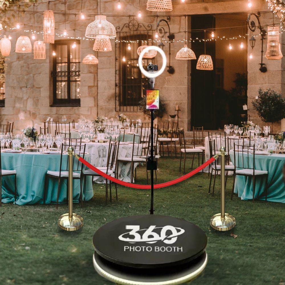 Guests enjoying the 360-camera booth at a wedding in Paris.”